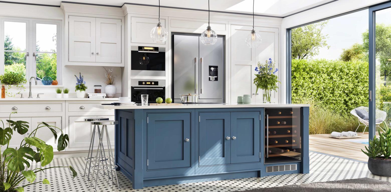 blue kitchen island in the middle of large kitchen, white cabinets and tile floor with indoor plants and big windows