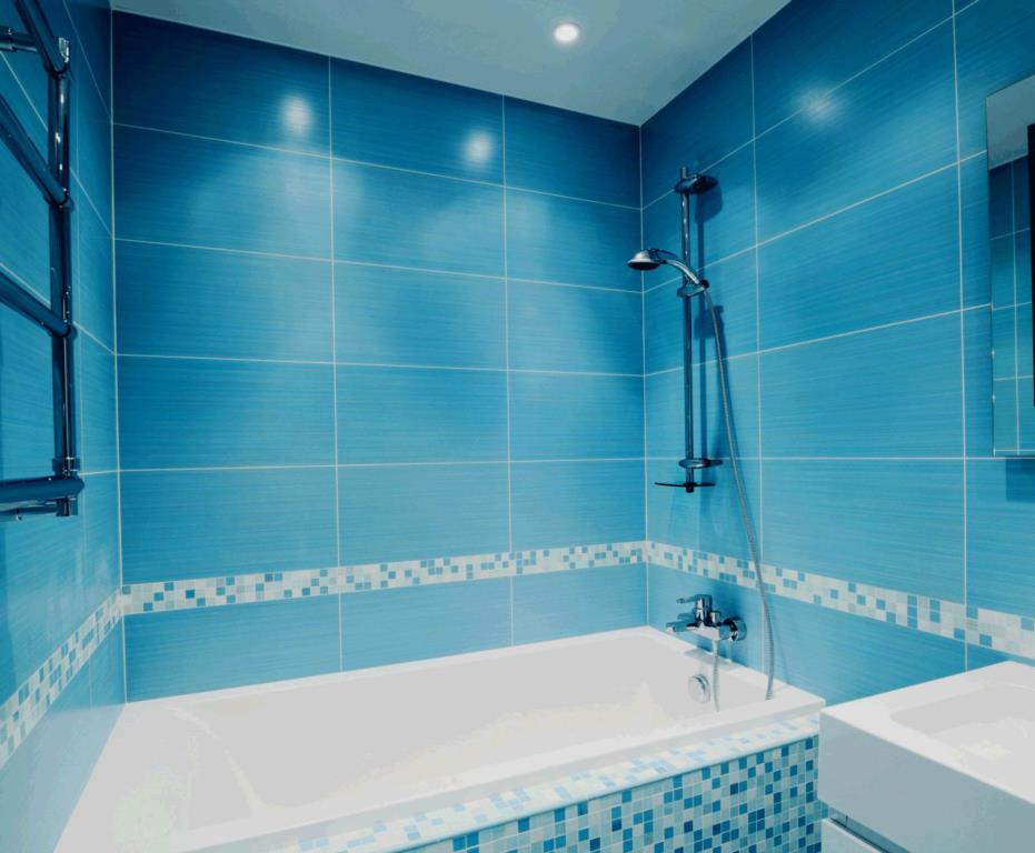 blue tile shower in blue bathroom